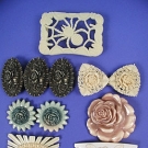 7 CARVED PLASTIC BUCKLES &amp; CLASPS, 1930s
