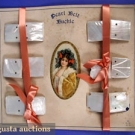 LOT OF CARDED MOTHER OF PEARL CLASPS, c. 1890