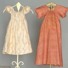 TWO INFANTS' CALICO DRESSES, 1805-1820