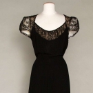 TRAINED BLACK EVENING GOWN, c. 1940