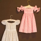 TWO TODDLERS' CALICO DRESSES, 1830-1840