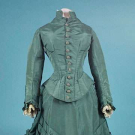 SAGE GREEN SILK VISITING DRESS, EARLY 1880s