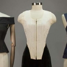 THREE DESIGNERS' CORSET STYLE BODICES, 1980-1990s
